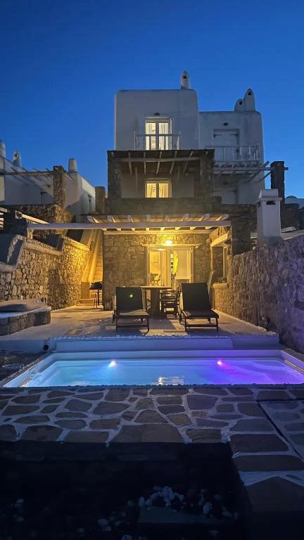 Nalu’s stone facade, lit for the evening