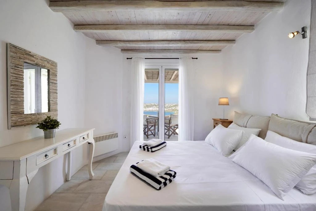 The bedroom, with sea-view balcony